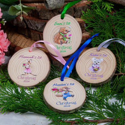 Four first christmas wood slice ornaments