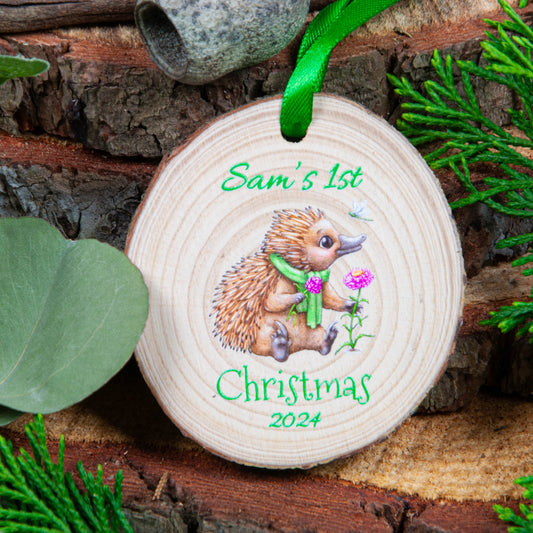 First Christmas ornament - echidna on wood slice